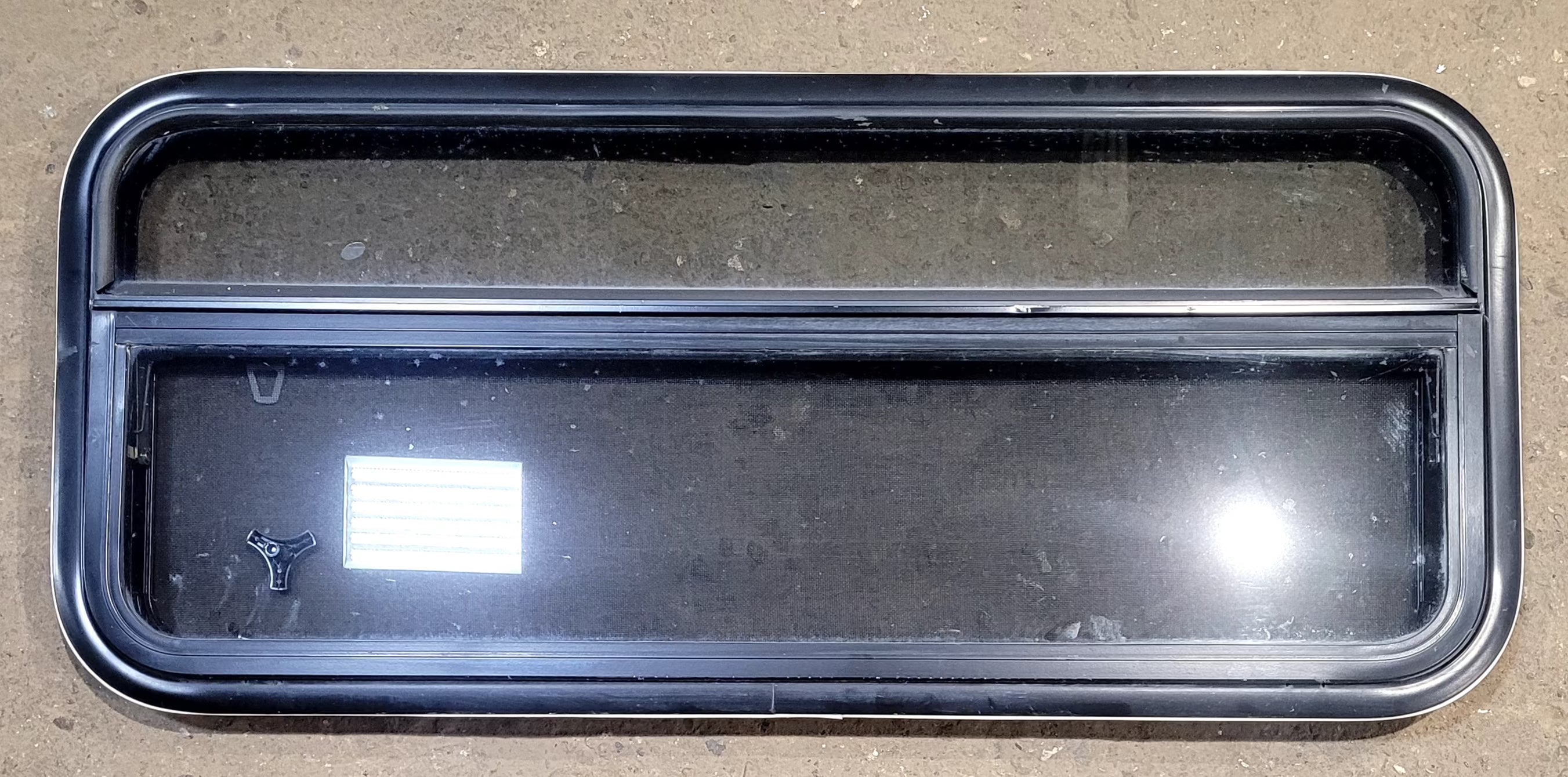 Used Black Radius Opening Window : 41 1/4" W x 17 1/4" H x 1 1/8" D