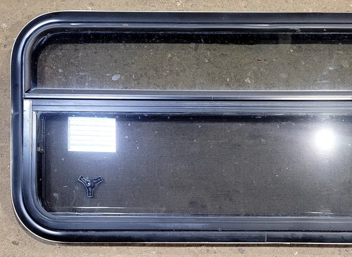 Used Black Radius Opening Window : 41 1/4" W x 17 1/4" H x 1 1/8" D - Young Farts RV Parts