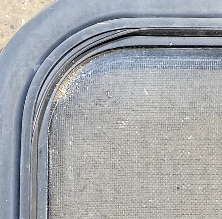 Used Black Radius Opening Window : 29 1/4" W x 21 1/4" H x 1 1/4" D - Young Farts RV Parts