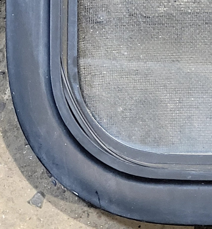 Used Black Radius Opening Window : 29 1/4" W x 21 1/4" H x 1 1/4" D - Young Farts RV Parts