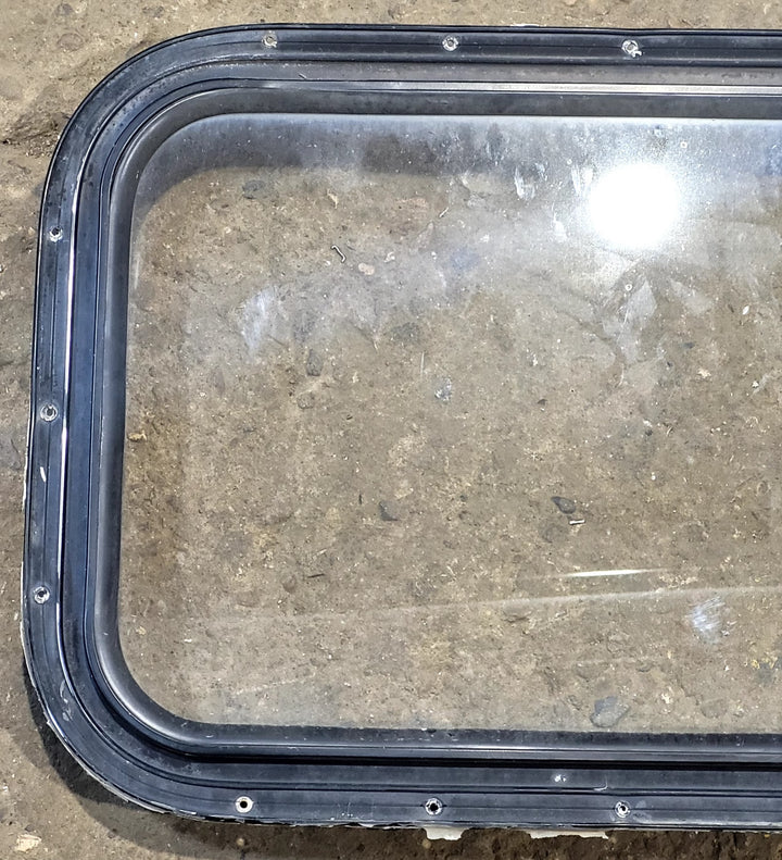 Used Black Radius Non Opening Window : 25" W x 16 3/4" H x 1 5/8" D - Young Farts RV Parts