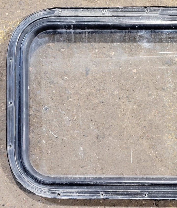 Used Black Radius Non Opening Window : 25" W x 16 3/4" H x 1 5/8" D - Young Farts RV Parts
