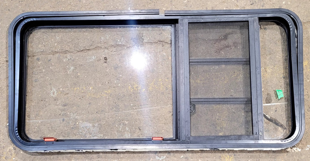 Used Black Radius Emergency Opening Window : 48 3/4" W x 23 1/2" H x 1 5/8" D