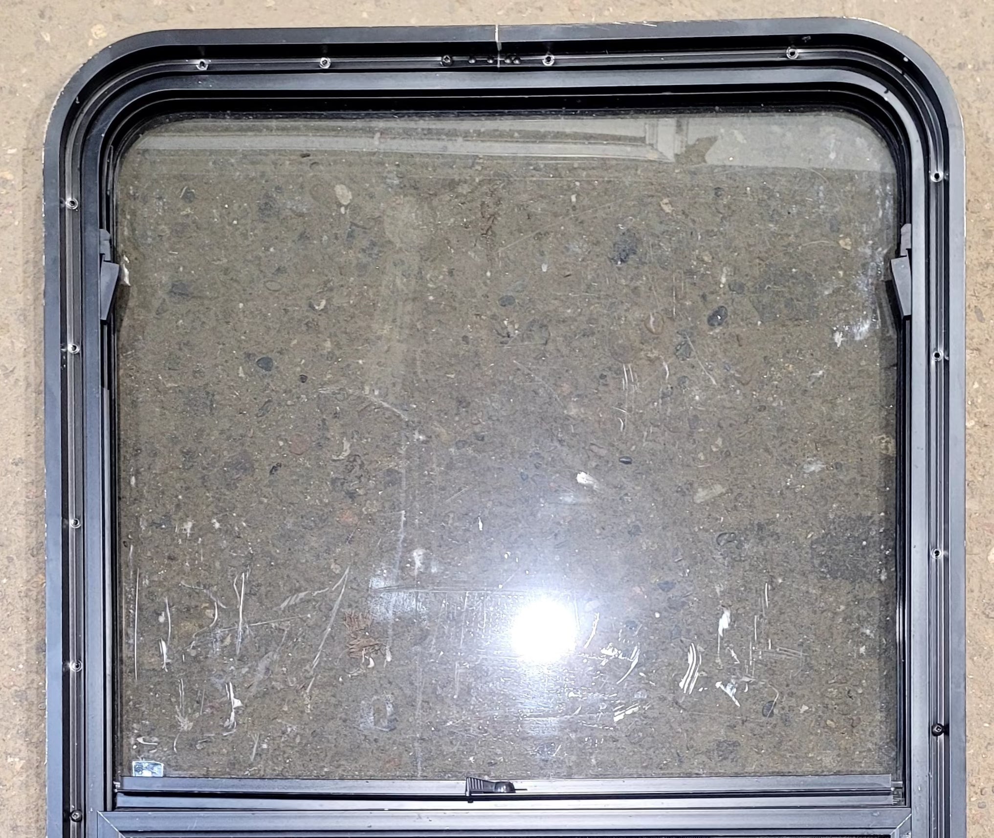 Used Black Radius Opening Window : 25 3/4" W x 41 3/4" H x 1 7/8" D - Young Farts RV Parts