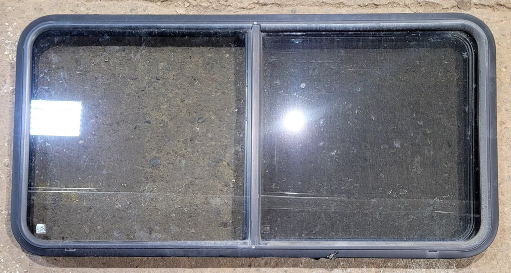 Used Black Radius Opening Window : 47 3/4" W x 23 3/4" H x 1 7/8" D