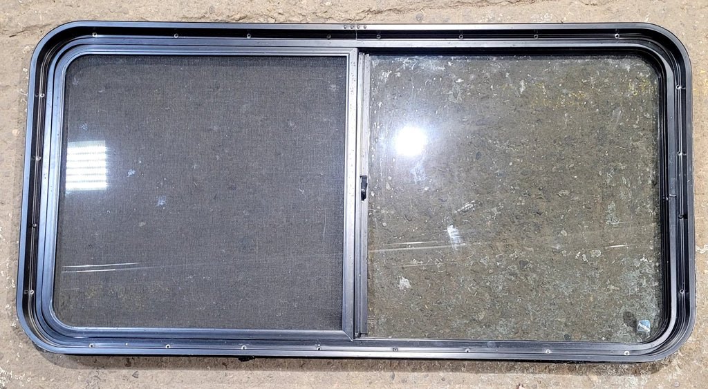 Used Black Radius Opening Window : 47 3/4" W x 23 3/4" H x 1 7/8" D