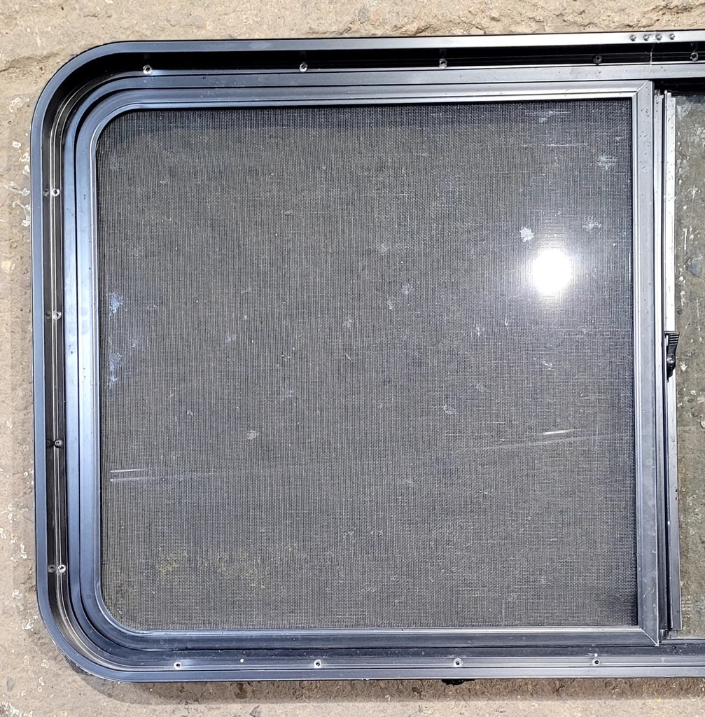 Used Black Radius Opening Window : 47 3/4" W x 23 3/4" H x 1 7/8" D