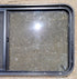 Used Black Radius Opening Window : 47 3/4" W x 23 3/4" H x 1 7/8" D - Young Farts RV Parts