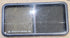 Used Black Radius Opening Window : 47 3/4" W x 23 3/4" H x 1 7/8" D - Young Farts RV Parts