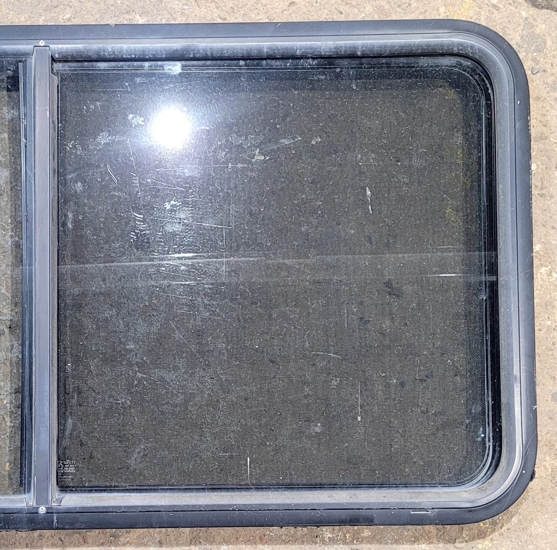 Used Black Radius Opening Window : 47 3/4" W x 23 3/4" H x 1 7/8" D