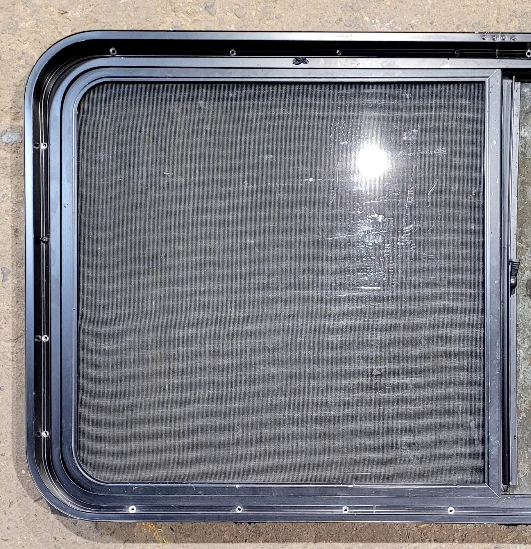Used Black Radius Opening Window : 47 3/4" W x 23 3/4" H x 1 7/8" D - Young Farts RV Parts