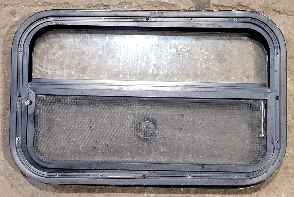 Used Black Radius Opening Window : 23 1/2" W x 14 1/2" H x 1 3/4" D