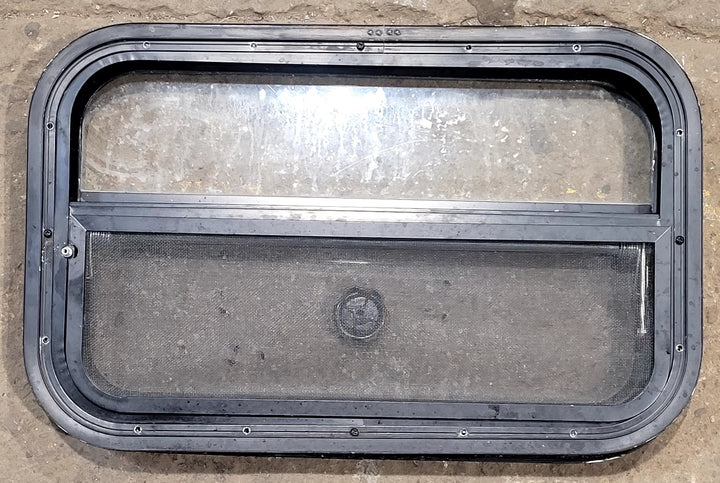 Used Black Radius Opening Window : 23 1/2" W x 14 1/2" H x 1 3/4" D - Young Farts RV Parts