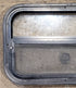 Used Black Radius Opening Window : 23 1/2" W x 14 1/2" H x 1 3/4" D - Young Farts RV Parts