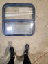 Used Black Radius Opening Window : 25 1/2" W x 25 1/2" H x 1 3/4" D - Young Farts RV Parts