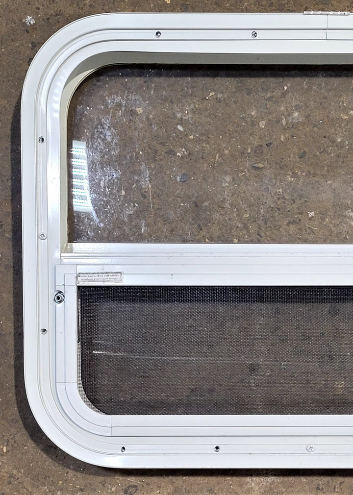 Used White Radius Opening Window : 23 1/2" W x 17 1/2" H x 1 7/8" D - Young Farts RV Parts
