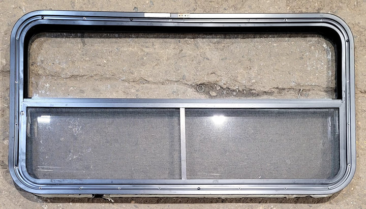 Used Black Radius Opening Window : 41 1/4" W x 21 1/4" H x 1 3/4" D - Young Farts RV Parts