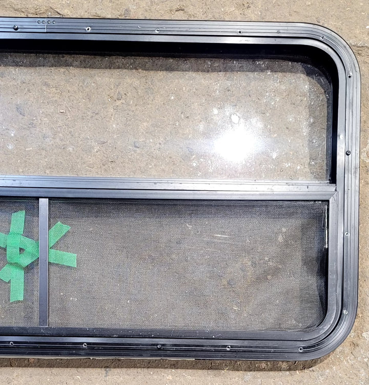 Used Black Radius Opening Window : 41 1/2" W x 21 1/2" H x 1 1/2" D - Young Farts RV Parts