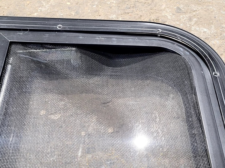 Used Black Radius Opening Window : 41 1/2" W x 21 1/2" H x 1 1/2" D - Young Farts RV Parts