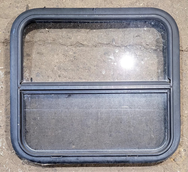 Used Black Radius Opening Window : 23 1/2" W x 21 1/4" H x 1 1/4" D - Young Farts RV Parts