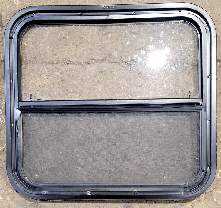 Used Black Radius Opening Window : 23 1/2" W x 21 1/4" H x 1 1/4" D - Young Farts RV Parts