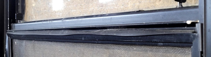 Used Black Radius Opening Window : 23 1/2" W x 21 1/4" H x 1 1/4" D - Young Farts RV Parts