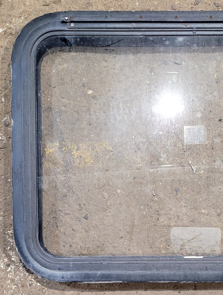 Used Black Radius Emergency Opening Window : 29 1/2" W x 21 1/2" H x 1 5/8" D - Young Farts RV Parts