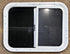 Used White Radius Opening Window : 23 1/2" W x 17 1/2" H x 1 1/4" D - Young Farts RV Parts