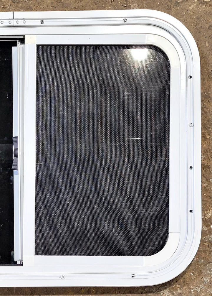 Used White Radius Opening Window : 23 1/2" W x 17 1/2" H x 1 1/4" D - Young Farts RV Parts