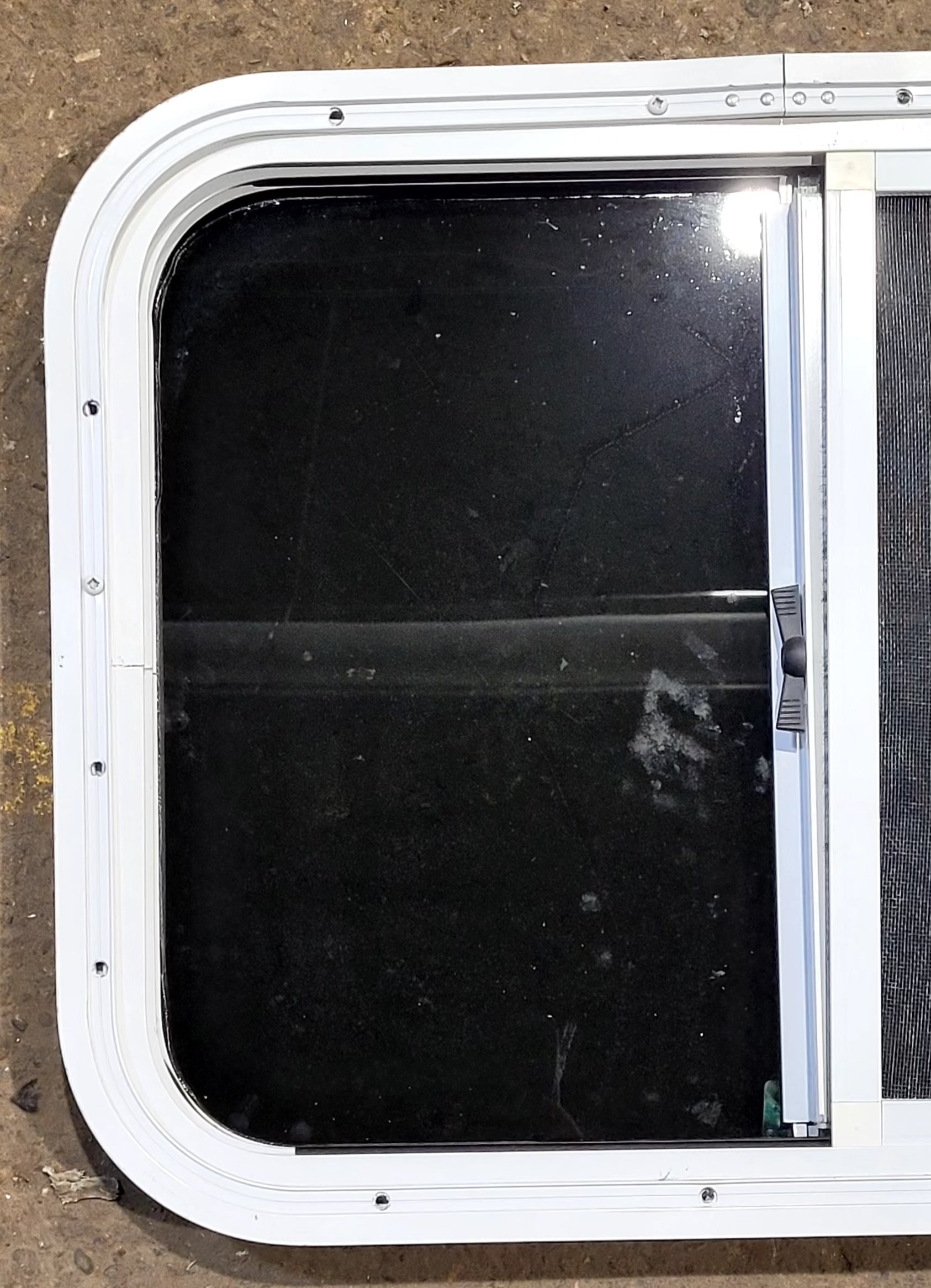 Used White Radius Opening Window : 23 1/2" W x 17 1/2" H x 1 1/4" D - Young Farts RV Parts
