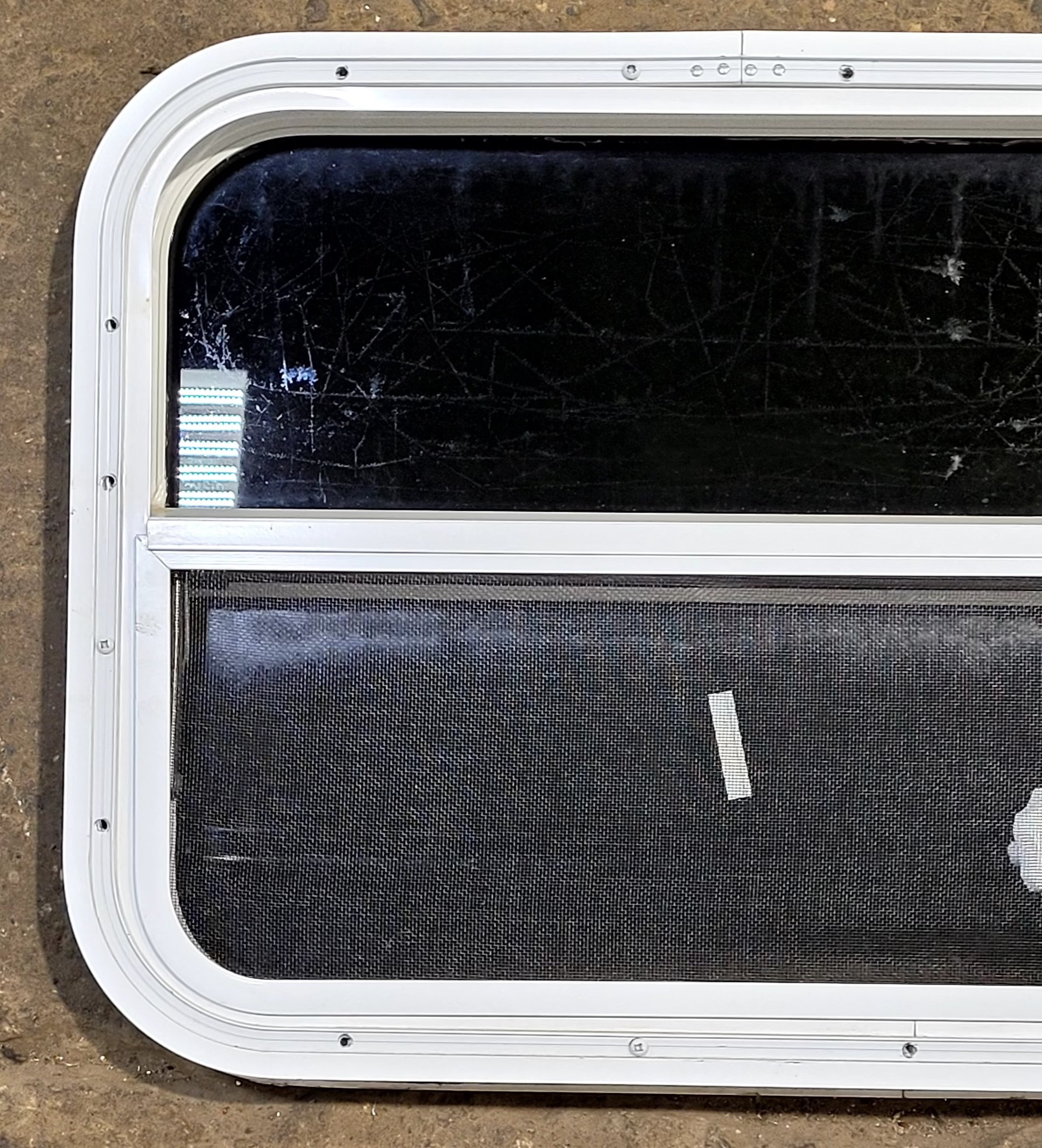 Used White Radius Opening Window : 23 1/2" W x 17 1/2" H x 1 1/2" D - Young Farts RV Parts