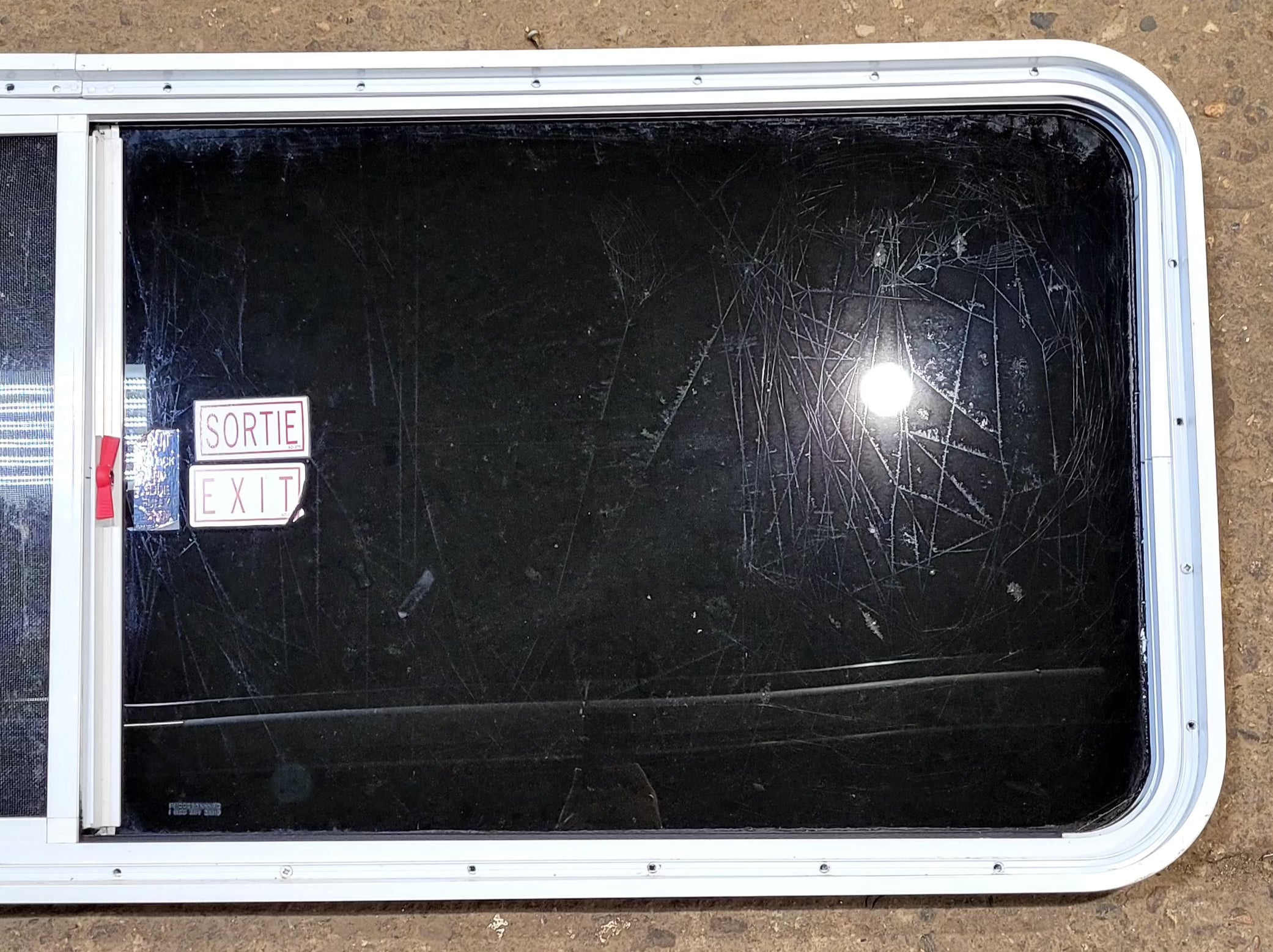 Used White Radius Emergency Opening Window : 59 1/2" W x 21 1/2" H x 1 3/4" D - Young Farts RV Parts