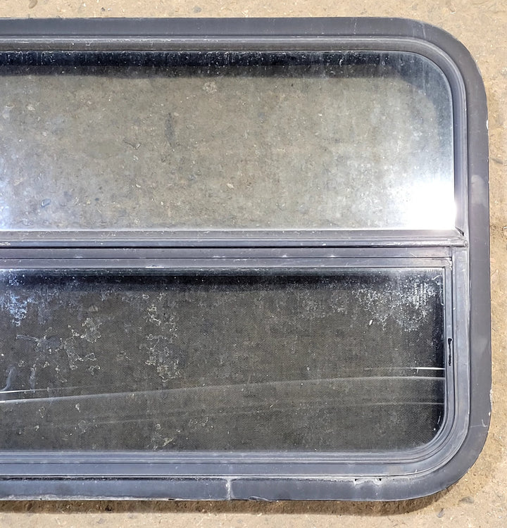 Used Black Radius Opening Window : 29 1/4" W x 21 1/4" H x 2" D - Young Farts RV Parts