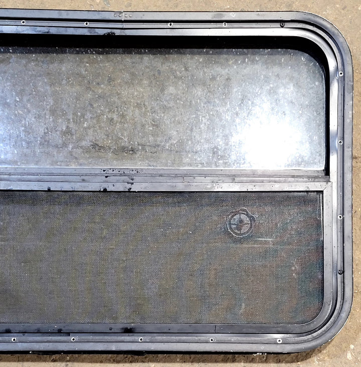 Used Black Radius Opening Window : 29 1/4" W x 21 1/4" H x 2" D - Young Farts RV Parts