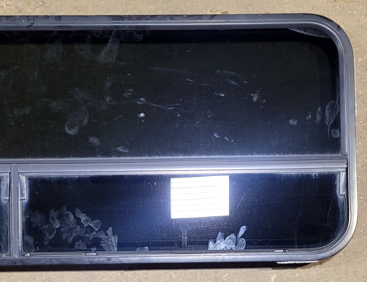 Used Black Radius Opening Window : 57 1/2" W x 20 1/4" H x 1" D - Young Farts RV Parts