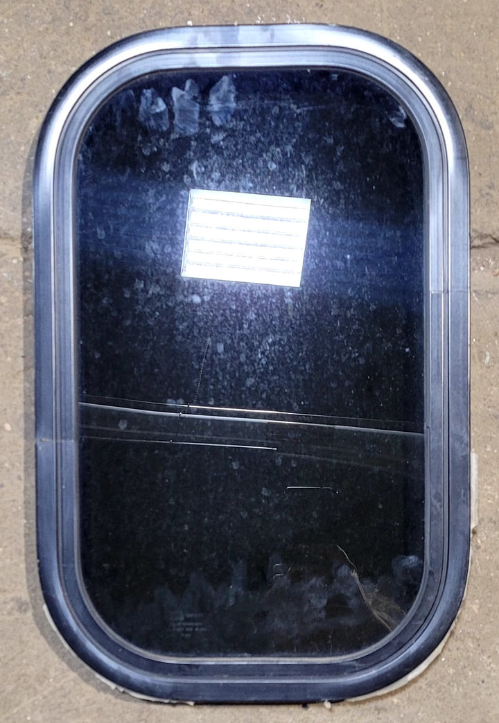 Used Black Radius Non Opening Window : 11 1/4" W x 18 1/4" H x 1" D - Young Farts RV Parts