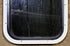 Used Black Radius Non Opening Window : 14 3/4" W x 18 1/4" H x 1 1/8" D - Young Farts RV Parts