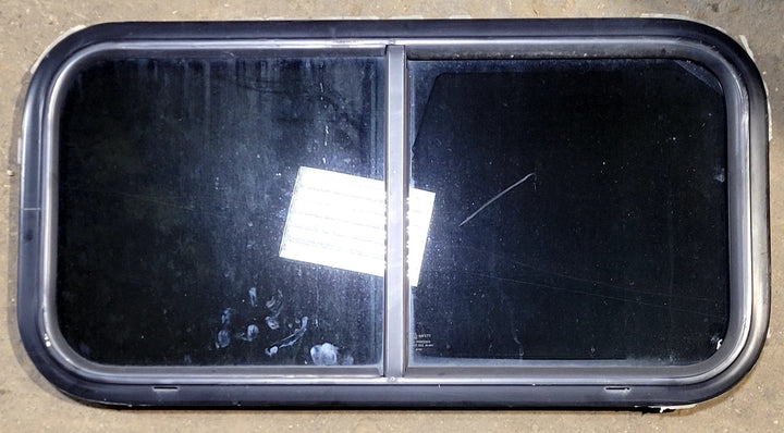 Used Black Radius Opening Window : 31 1/2" W x 15 1/4" H x 1 1/8" D - Young Farts RV Parts