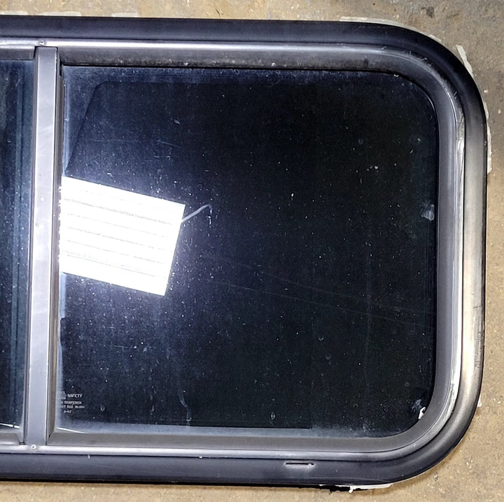 Used Black Radius Opening Window : 31 1/2" W x 15 1/4" H x 1 1/8" D - Young Farts RV Parts