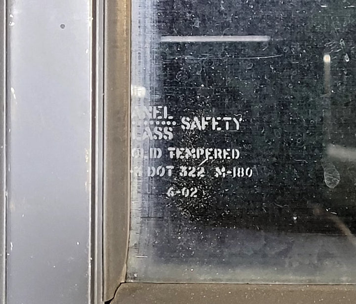 Used Black Radius Opening Window : 31 1/2" W x 15 1/4" H x 1 1/8" D - Young Farts RV Parts