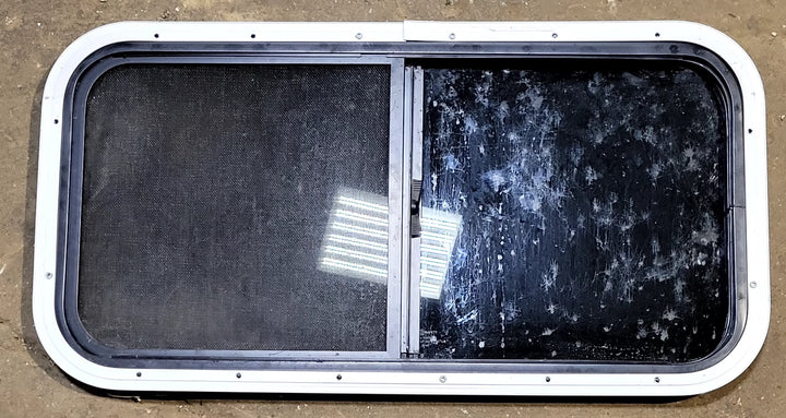 Used Black Radius Opening Window : 31 1/2" W x 15 1/4" H x 1 1/8" D - Young Farts RV Parts