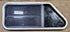 Used Slanted Black Radius Opening Window : 35 1/2" W x 14 3/4" H x 1 1/8" D - Young Farts RV Parts