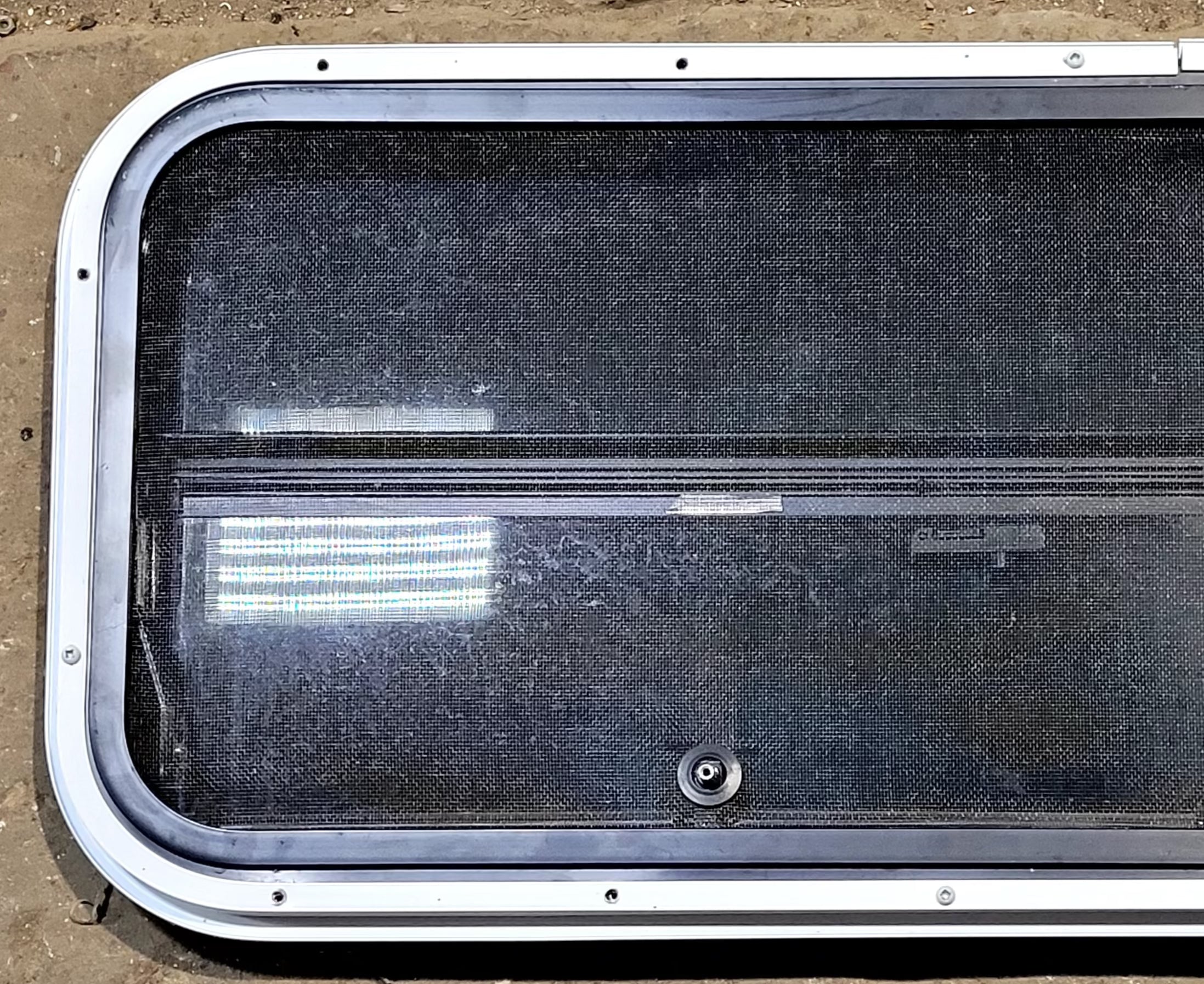 Used Slanted Black Radius Opening Window : 35 1/2" W x 14 3/4" H x 1 1/8" D - Young Farts RV Parts