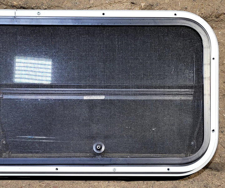 Used Slanted Black Radius Opening Window : 35 1/2" W x 14 3/4" H x 1 1/8" D - Young Farts RV Parts