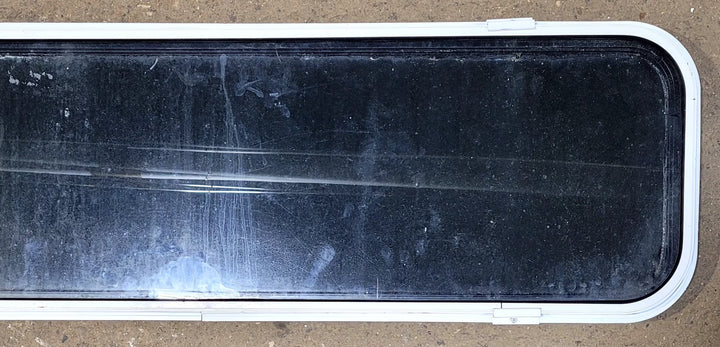 Used Black Radius Non Opening Window : 51 1/2" W x 14 1/4" H x 1" D - Young Farts RV Parts