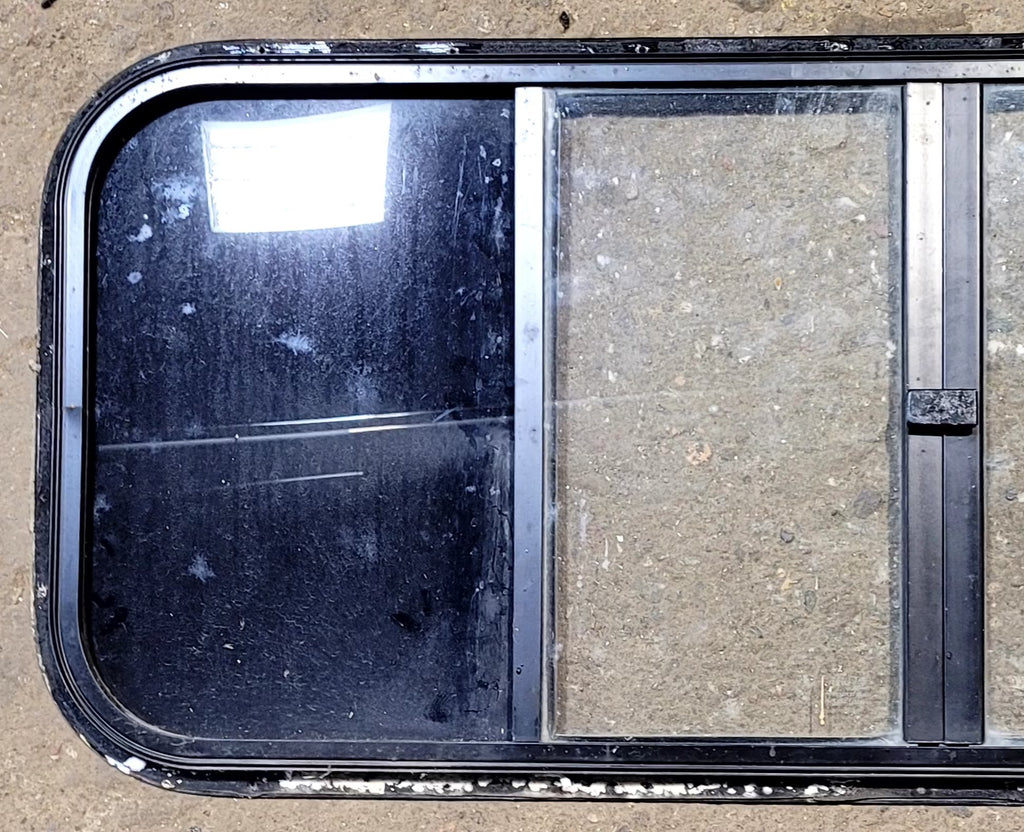 Used Black Radius Opening Window : 40 3/4" W x 16 3/4" H x 3/4" D - Truck Camper Front Slider