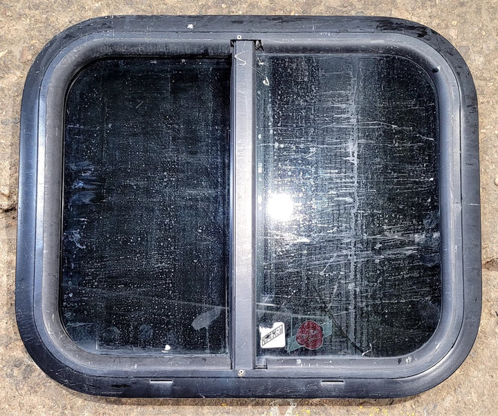 Used Black Radius Opening Window : 17 1/2" W x 14 1/4" H x 1 1/4" D - Young Farts RV Parts