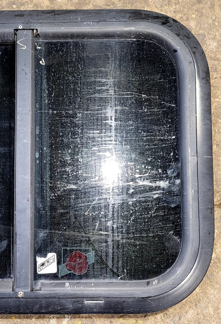 Used Black Radius Opening Window : 17 1/2" W x 14 1/4" H x 1 1/4" D - Young Farts RV Parts