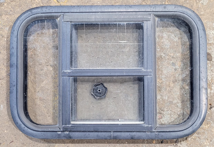 Used Black Radius Opening Window : 23 1/4" W x 15 1/4" H x 1 3/4" - Young Farts RV Parts