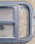 Used Black Radius Opening Window : 23 1/4" W x 15 1/4" H x 1 3/4" - Young Farts RV Parts